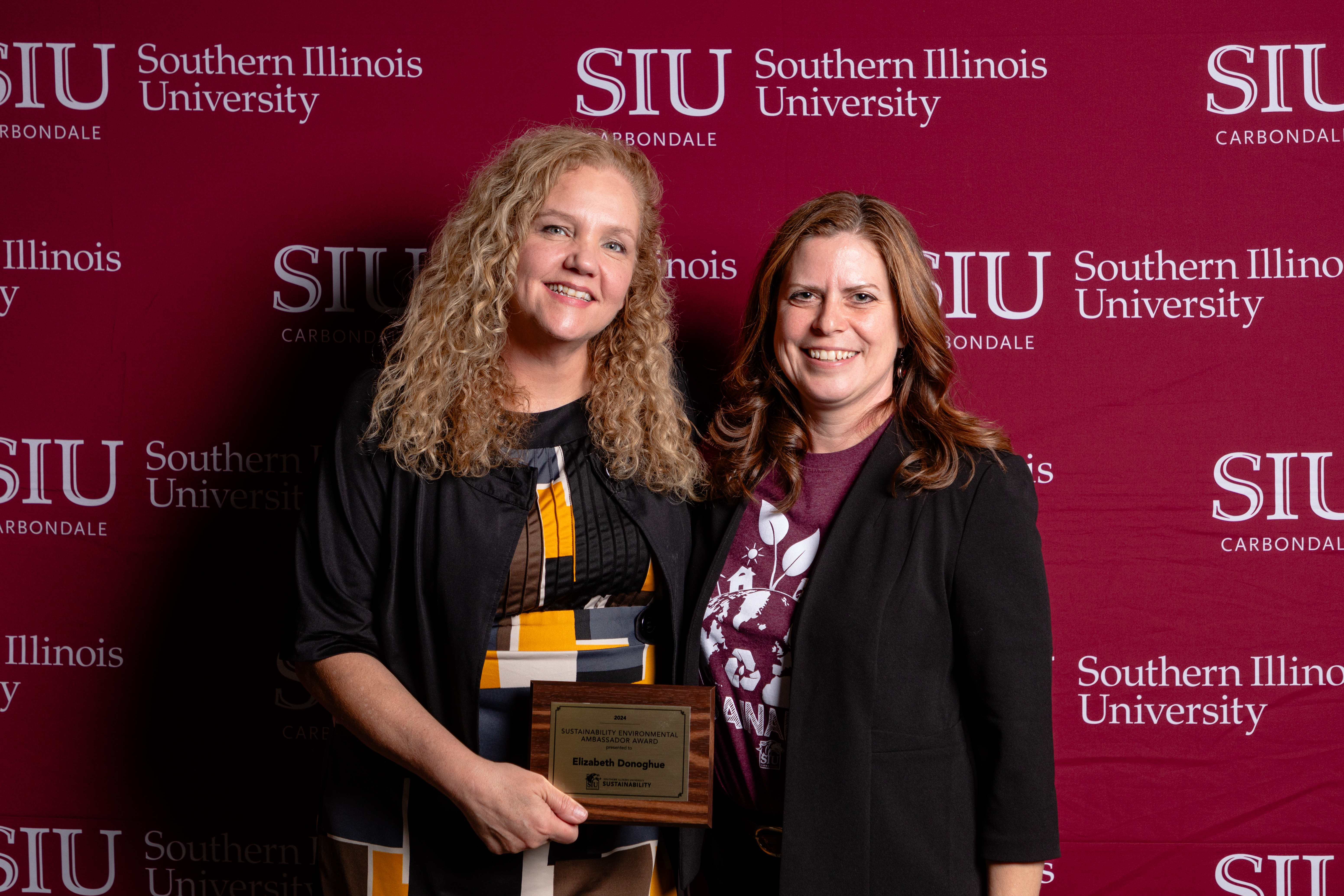 Elizabeth Donoghue accepts 2024 Sustainability Environmental Ambassador award