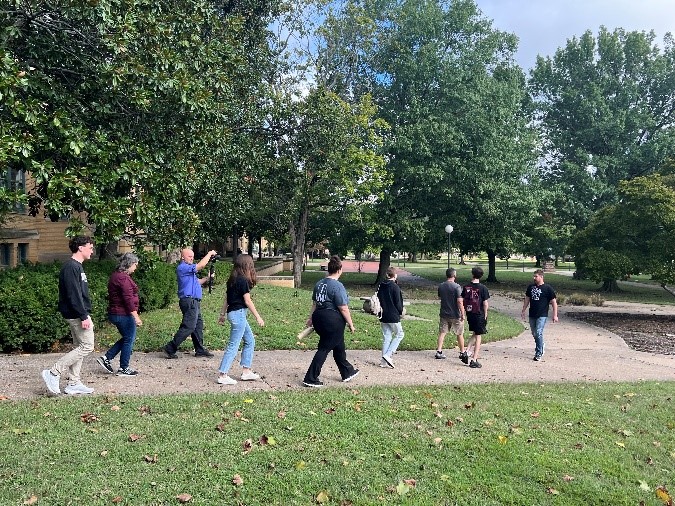 tree campus tour group going on a walk