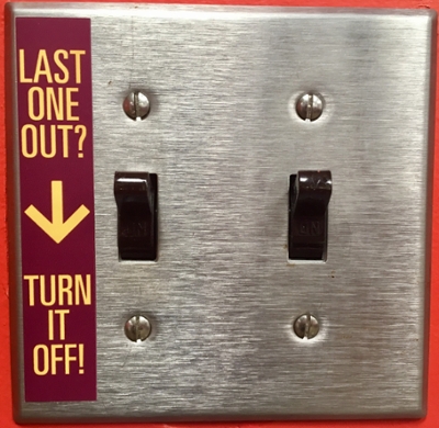 "Last one out, turn it off," sticker on light switch