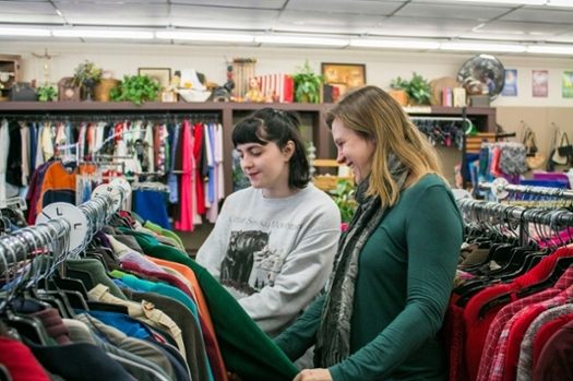 SGAT Karen and Cole check out clothing from a thrift store.