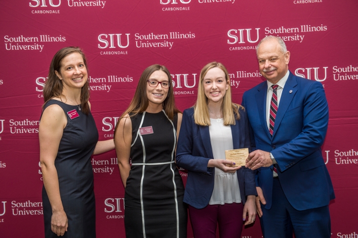Rachel Thomas receiving their award