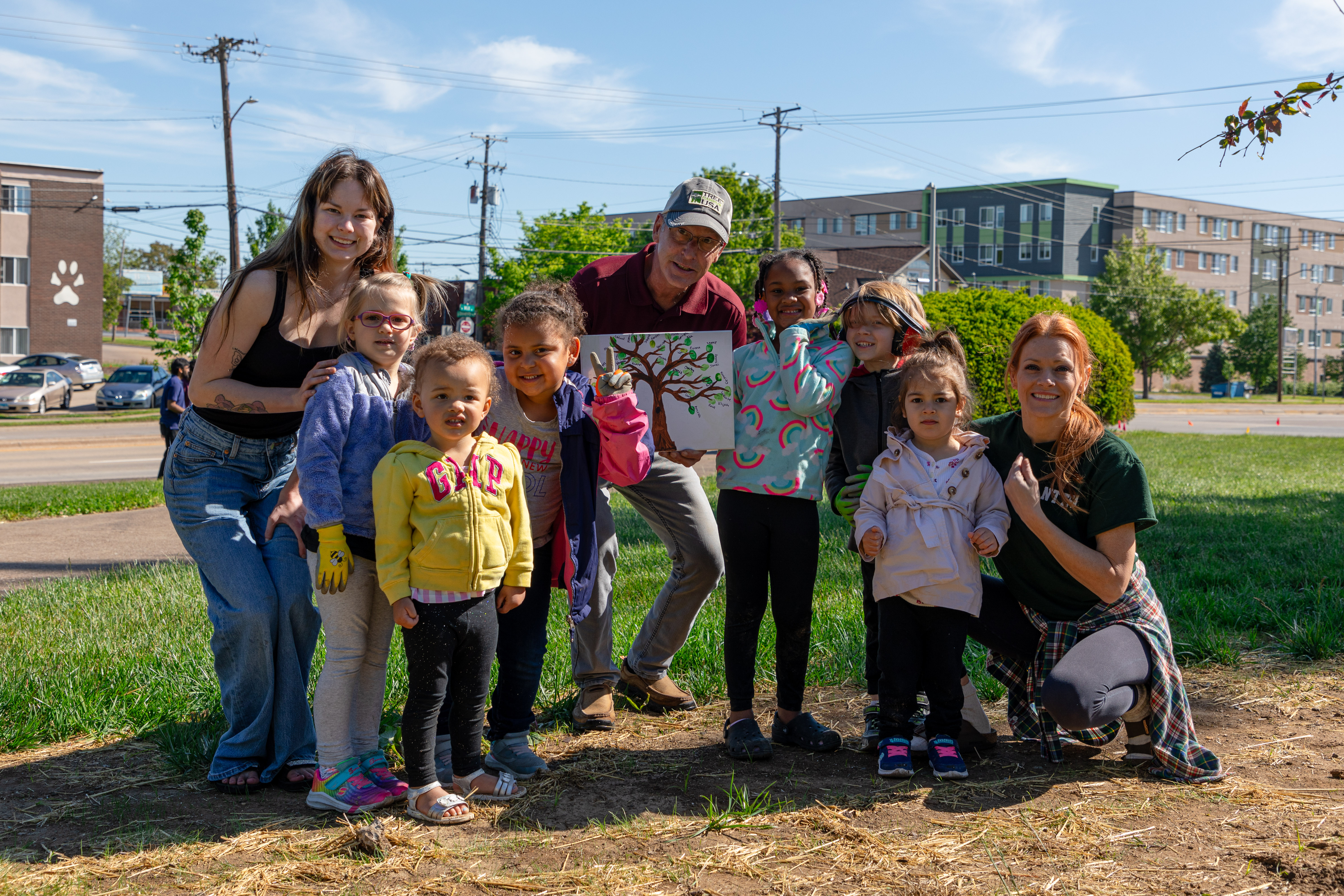 group of kids who helped plant trees