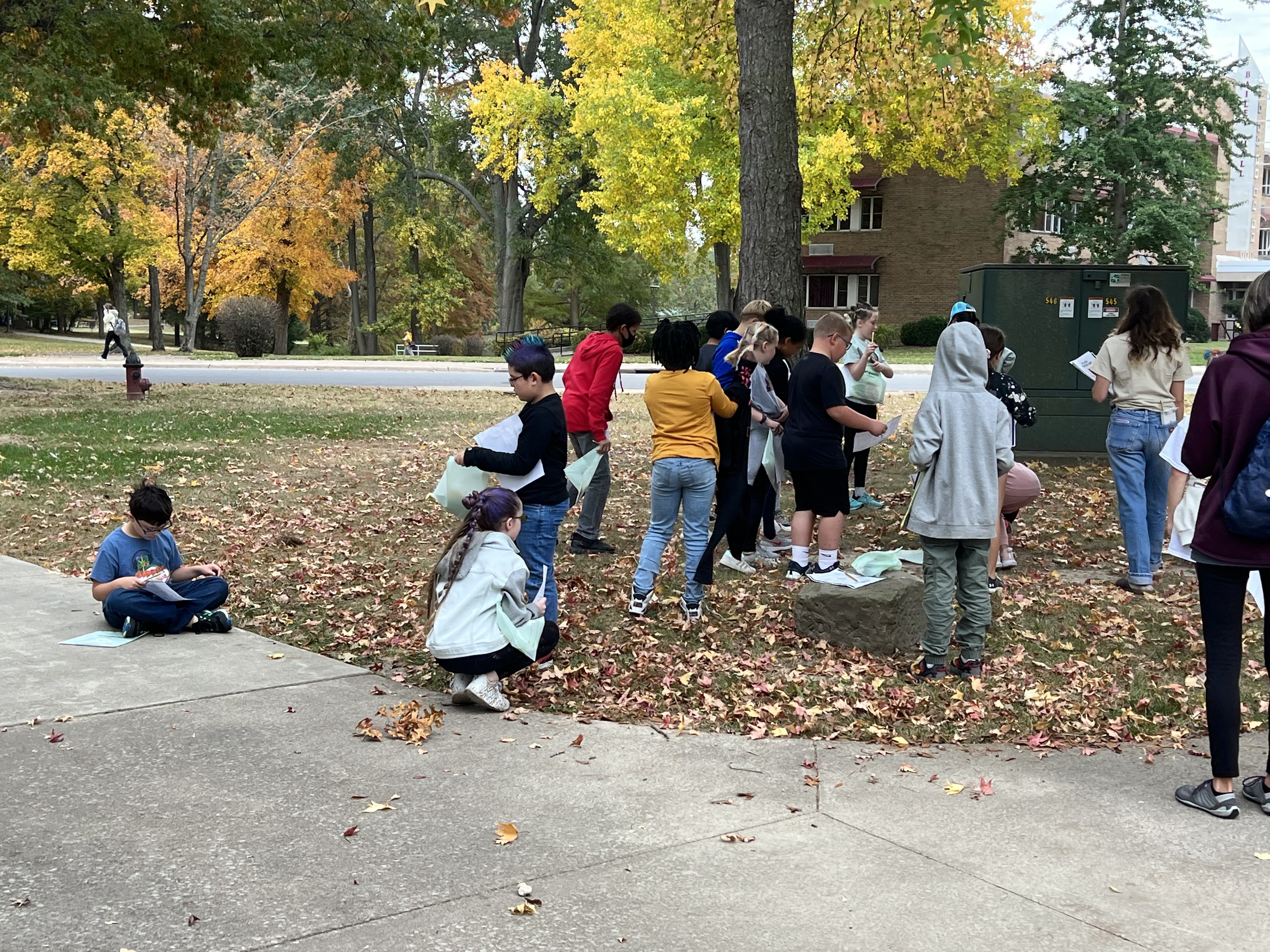 SIU Tree Planting kids with papers